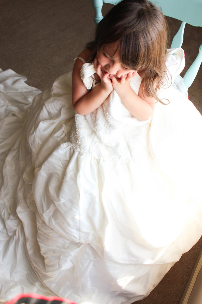 Let your daughter try on your wedding dress